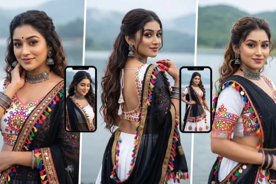 Indian woman wearing a traditional black and white saree with colorful embroidery posing beside a scenic lake