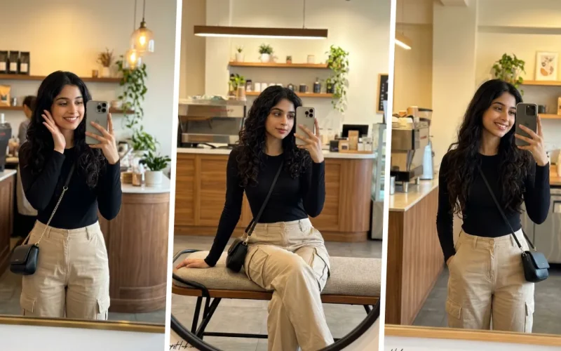 Ultra realistic café mirror selfie portrait of a stylish young woman wearing a black fitted top and beige cargo pants in a modern coffee shop setting