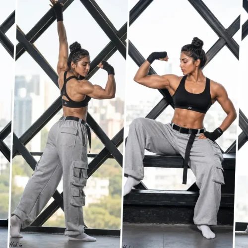 Ultra realistic muscular female fitness model posing in modern gym wear with cinematic athletic photography style