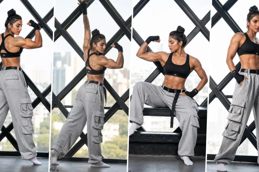 Ultra realistic muscular female fitness model posing in modern gym wear with cinematic athletic photography style